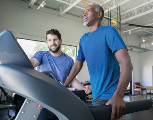 A man walking on a treadmill